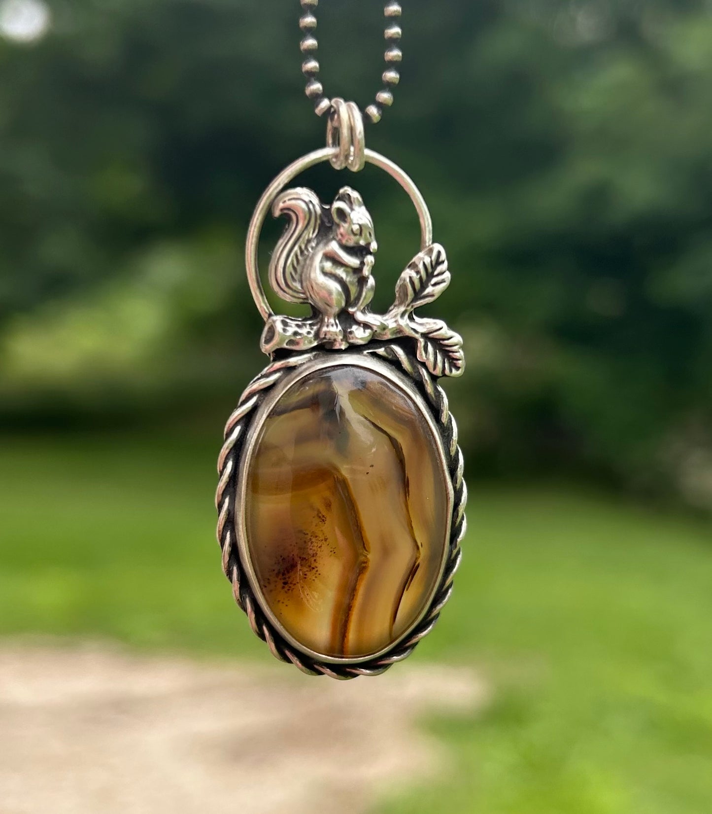 The Bentley Pendant Necklace, Montana Agate with Squirrel.  Solid Sterling Silver, 18” Ball Chain