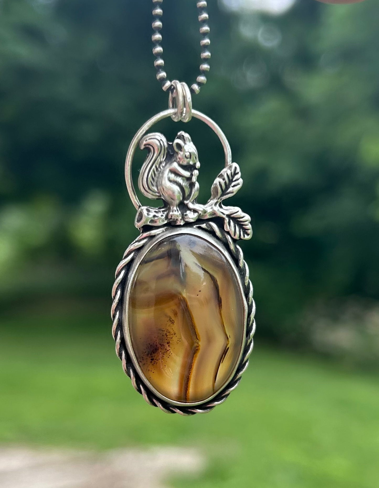 The Bentley Pendant Necklace, Montana Agate with Squirrel.  Solid Sterling Silver, 18” Ball Chain