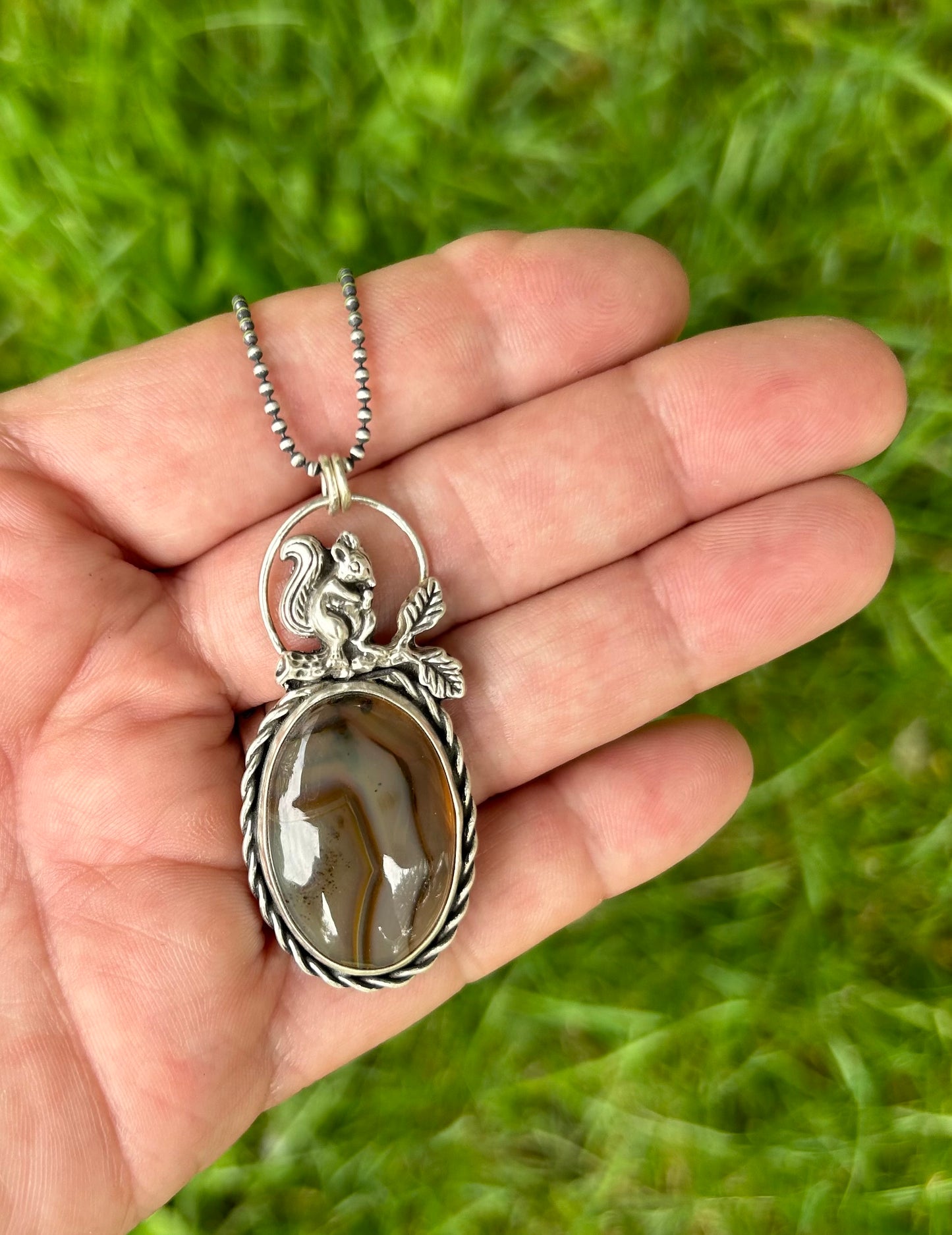 The Bentley Pendant Necklace, Montana Agate with Squirrel.  Solid Sterling Silver, 18” Ball Chain